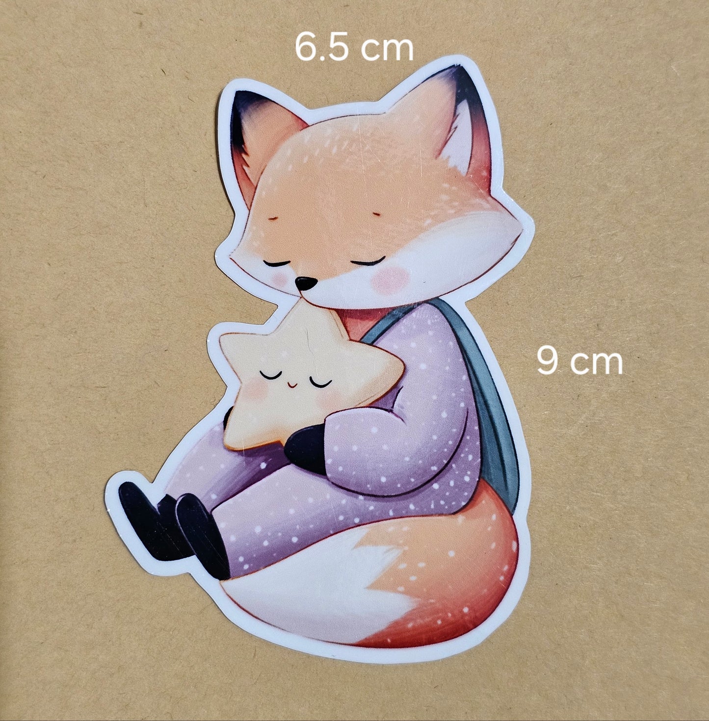 Sleeping fox hugging a star